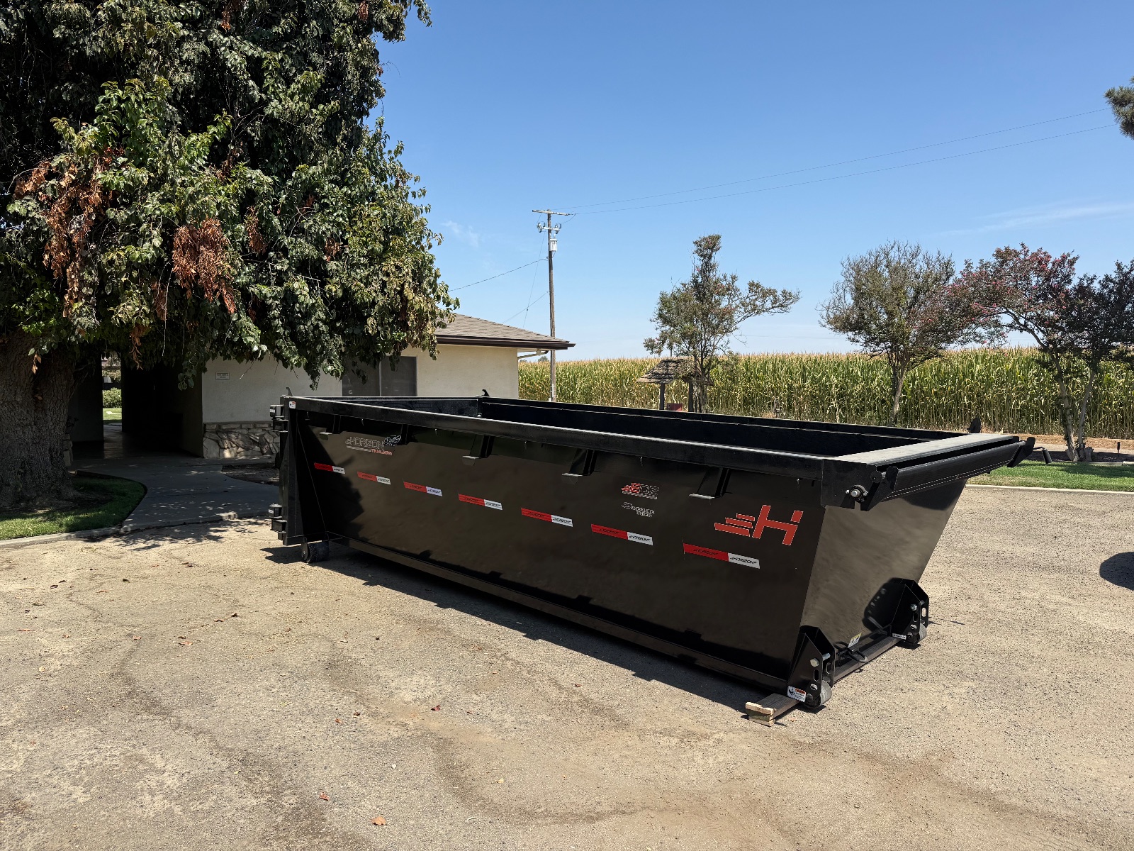 Swing door open on the 15-yard container for walk-in loading
